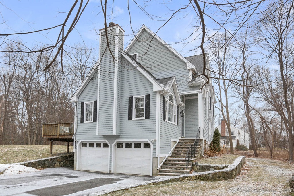 295 South Main Street Andover, MA 01810 - Photo 29 of 30 a view of a house with large tree and wooden fence