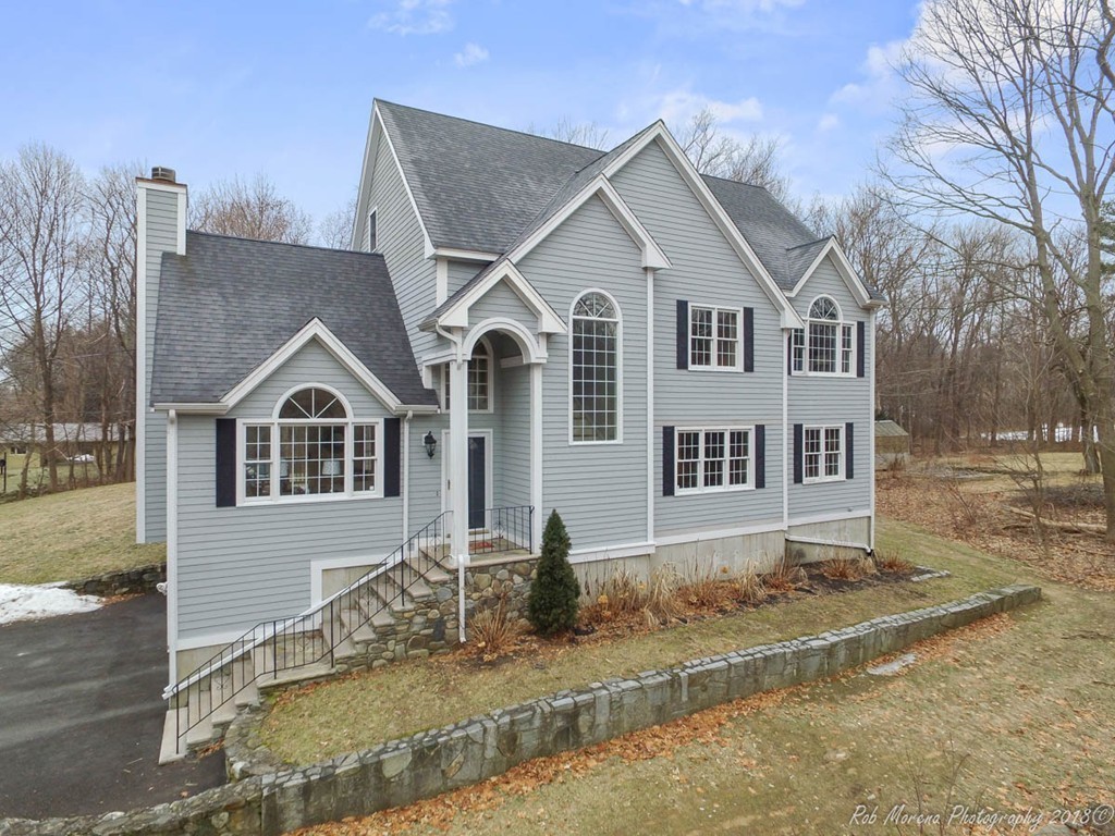 295 South Main Street Andover, MA 01810 - Photo 30 of 30 a front view of a house with garden