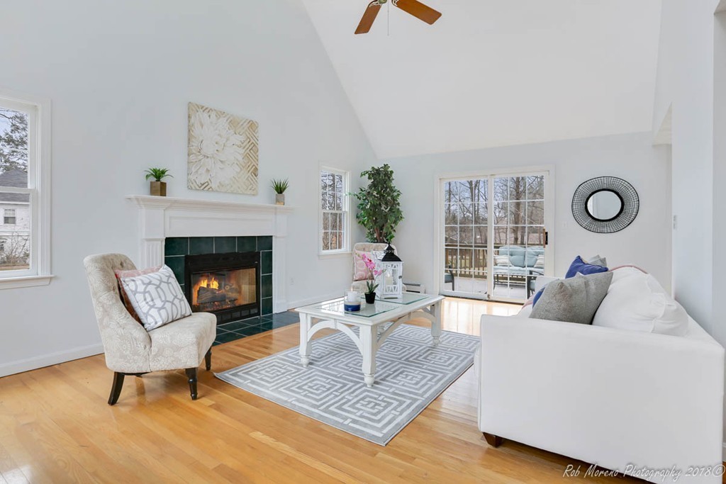 295 South Main Street Andover, MA 01810 - Photo 5 of 30 a living room with furniture and a fireplace