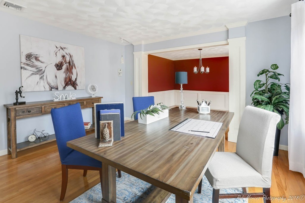 295 South Main Street Andover, MA 01810 - Photo 8 of 30 a view of a dining room with furniture and wooden floor