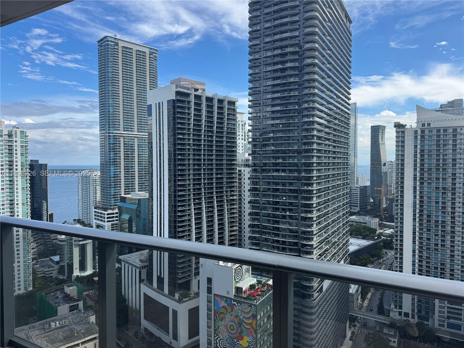 45 Southwest 9th Street, Unit 3404 Miami, FL 33130 - Photo 1 of 25 a view of a balcony with city view