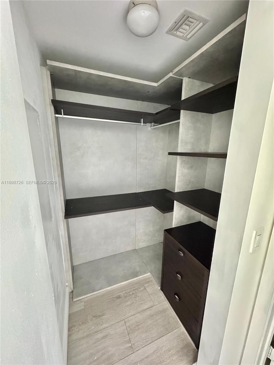 45 Southwest 9th Street, Unit 3404 Miami, FL 33130 - Photo 12 of 25 a view of walk in closet