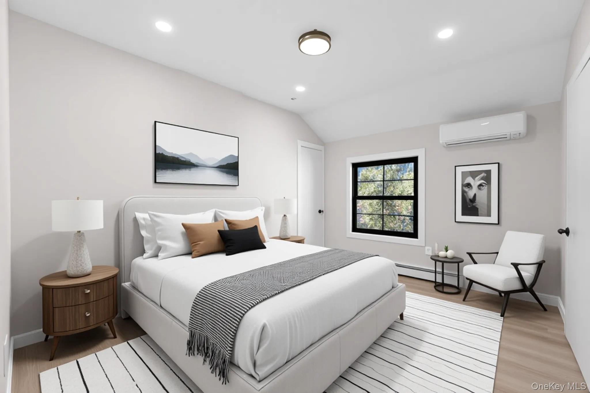 115-16 199th Street Queens, NY 11412 - Photo 5 of 21 Bedroom featuring light wood finished floors, recessed lighting, vaulted ceiling, a wall mounted AC, and baseboard heating