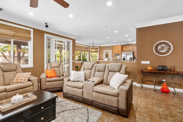 a living room with furniture and a table