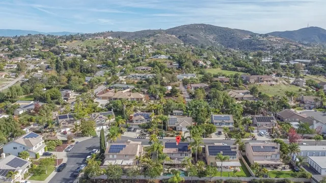 an aerial view of residential house and outdoor space