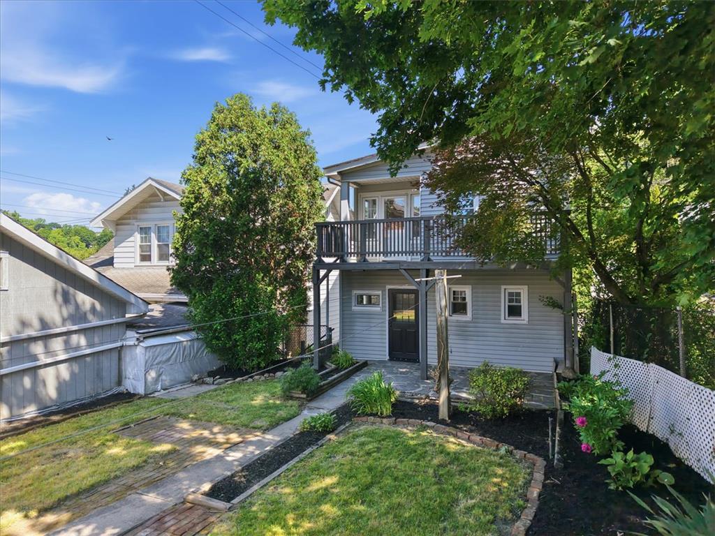 110 Messinger Street Bangor, PA 18013 - Photo 31 of 39 A quaint residence featuring a well-maintained yard and an upper-level balcony perfect for enjoying the outdoors.