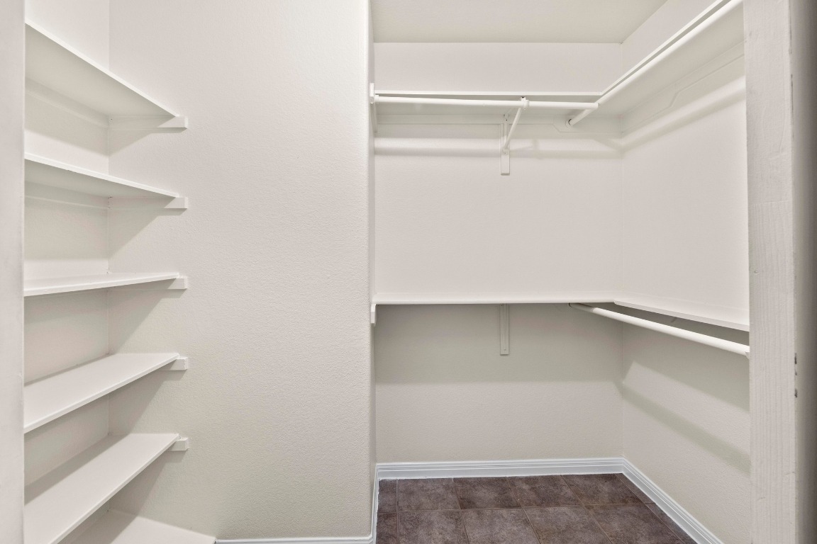 Undisclosed Address Austin, TX 78721 - Photo 11 of 17 a view of an empty walk in closet