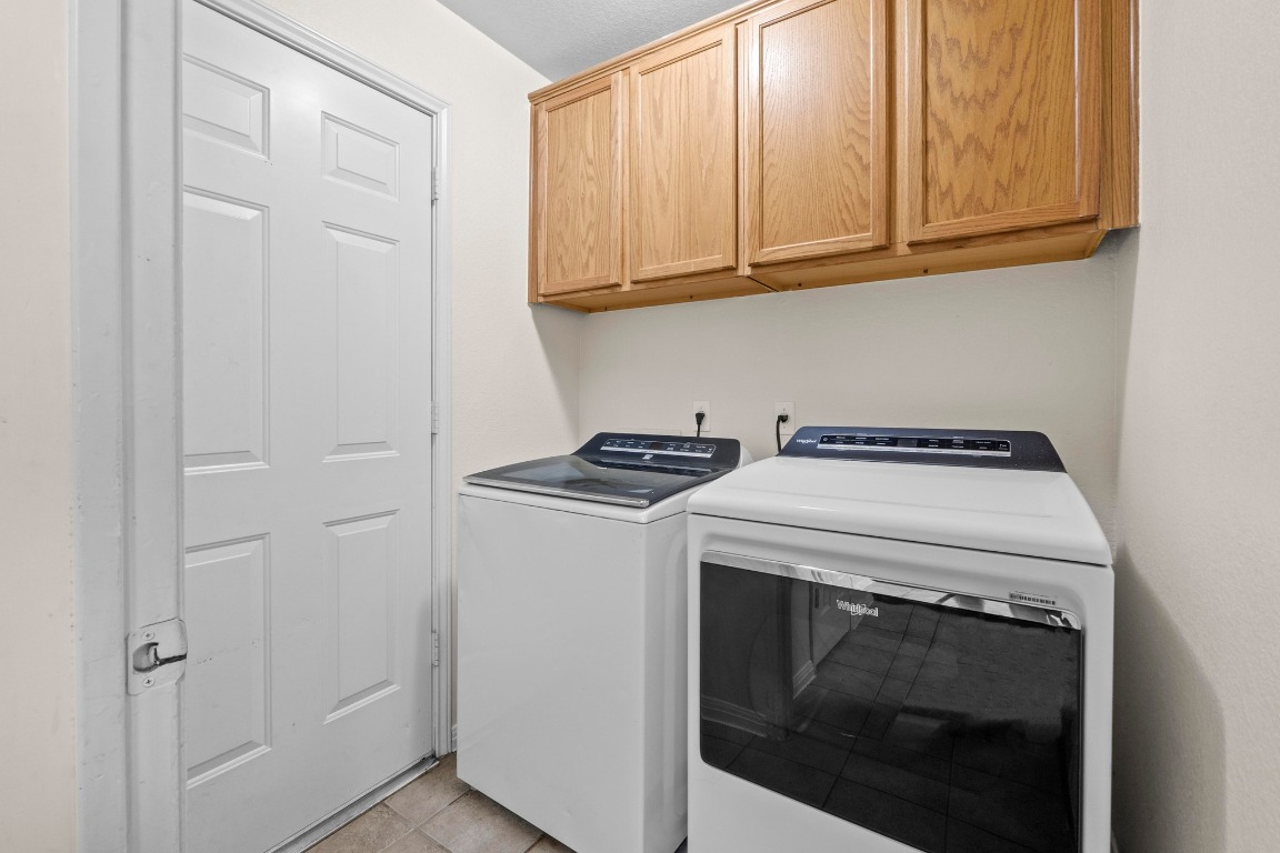 Undisclosed Address Austin, TX 78721 - Photo 16 of 17 a utility room with dryer and washer