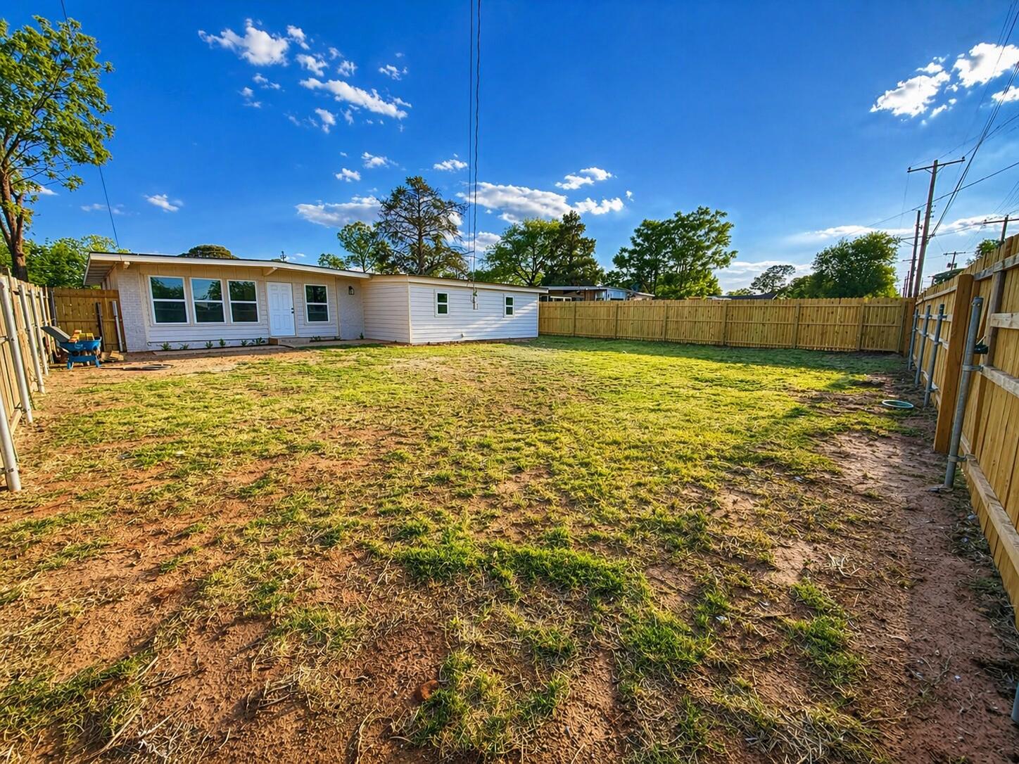 2316 48th Street Lubbock, TX 79412 - Photo 18 of 18 a view of a house with a yard