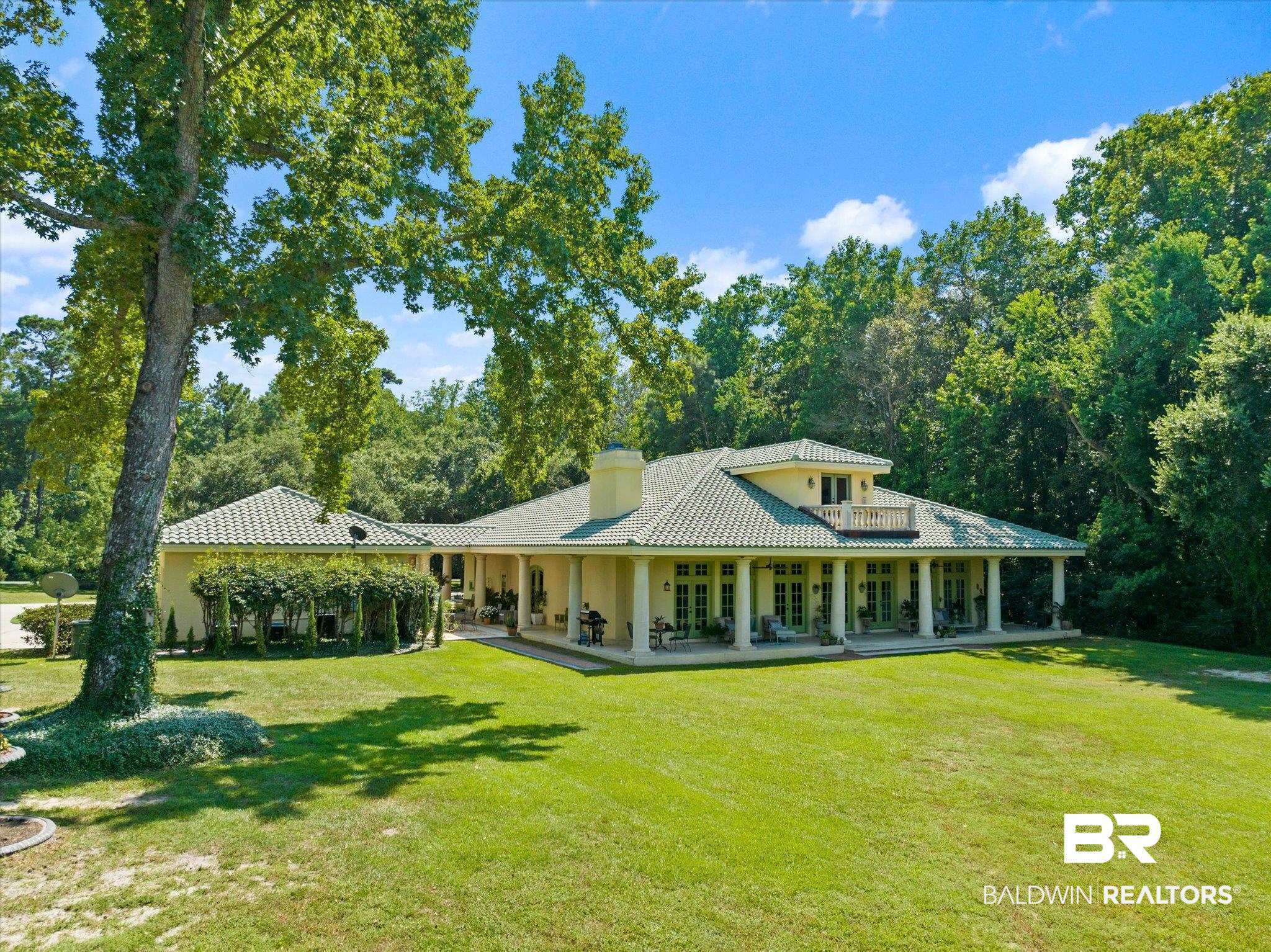 6341 Raintree Road Fairhope, AL 36532 - Photo 27 of 40 View of front of property with a front lawn