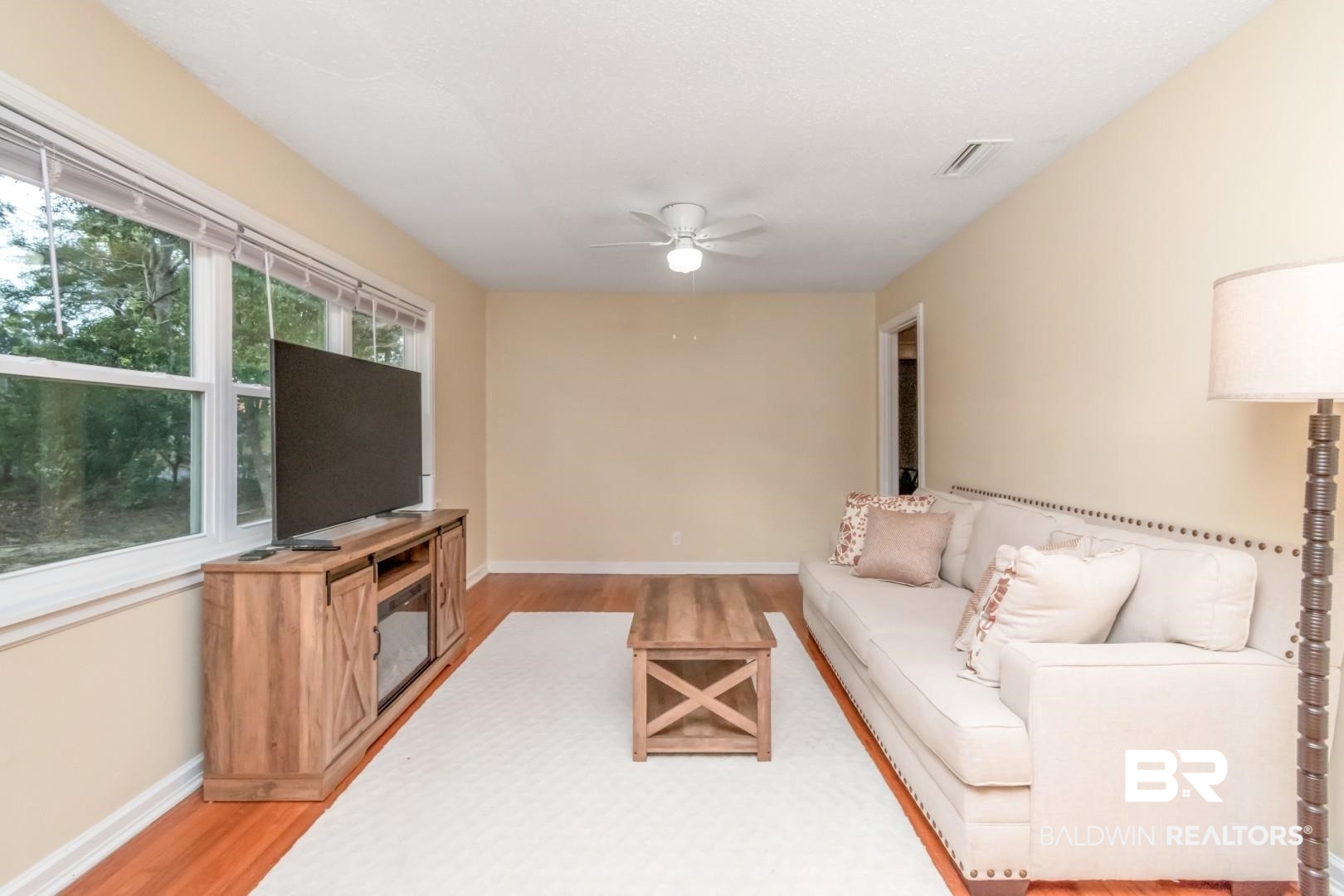 61 Nack Lane Mobile, AL 36608 - Photo 6 of 25 Living room with hardwood / wood-style floors and ceiling fan