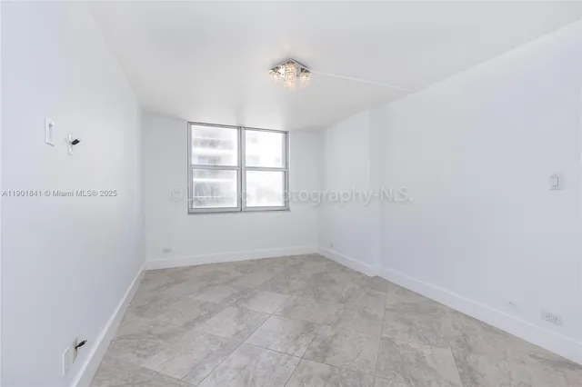 an empty room with a window