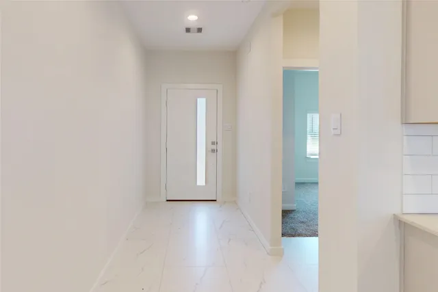 a view of a livingroom with wooden floor
