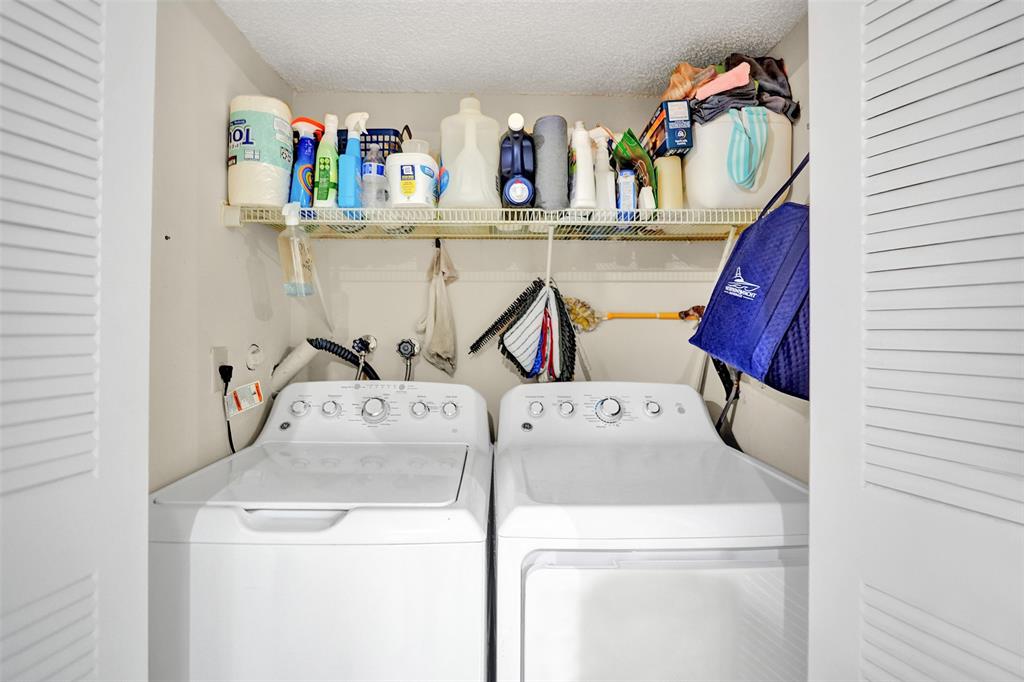 9851 Riverside Drive Coral Springs, FL 33071 - Photo 29 of 35 a utility room with dryer and washer