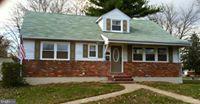 2016 Greengage Road Baltimore, MD 21244 - Photo 1 of 26 a front view of a house with a yard
