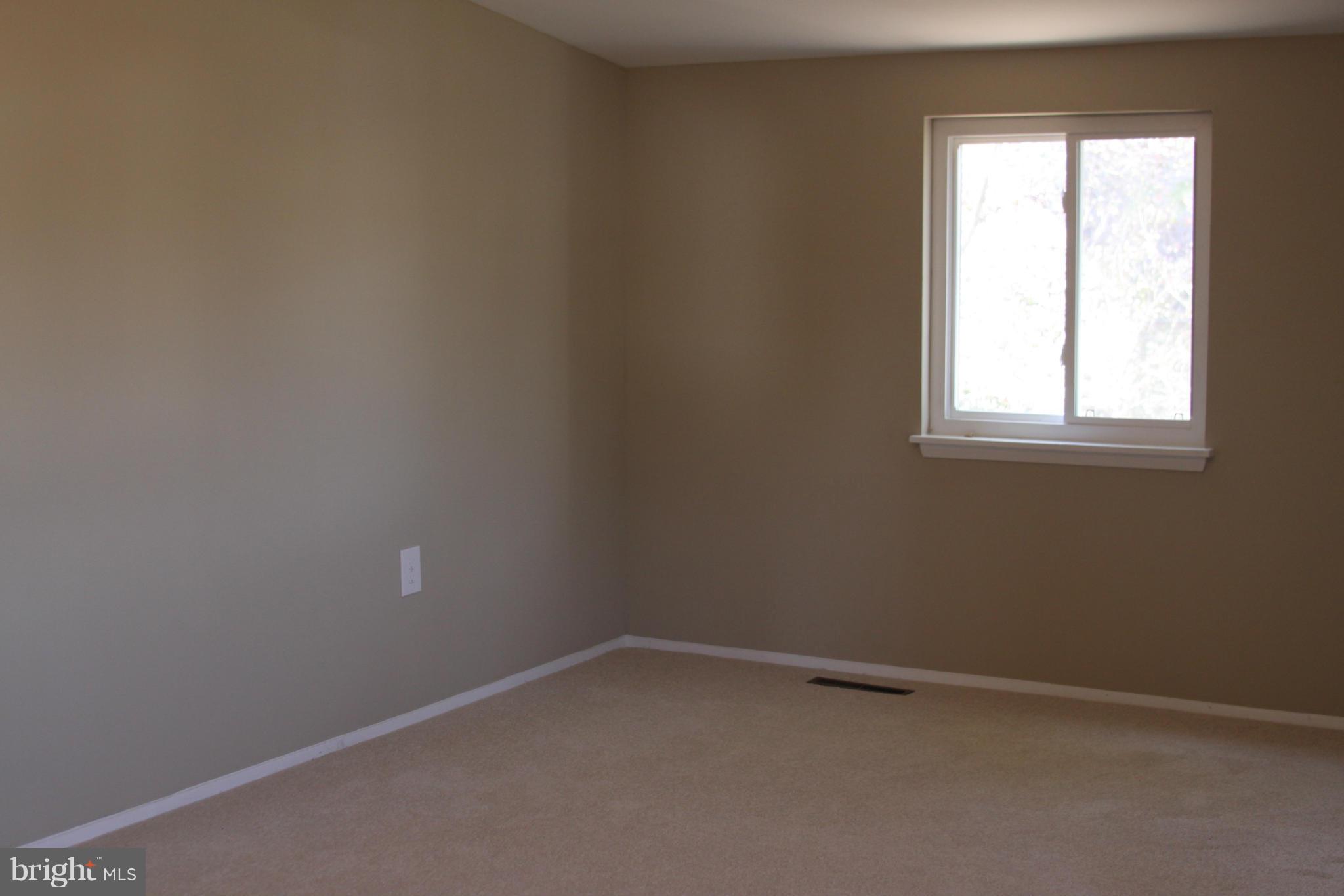 2016 Greengage Road Baltimore, MD 21244 - Photo 15 of 26 an empty room with a window