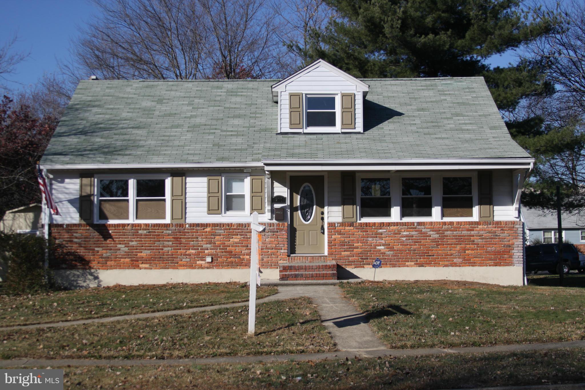 2016 Greengage Road Baltimore, MD 21244 - Photo 22 of 26 a front view of a house with garden