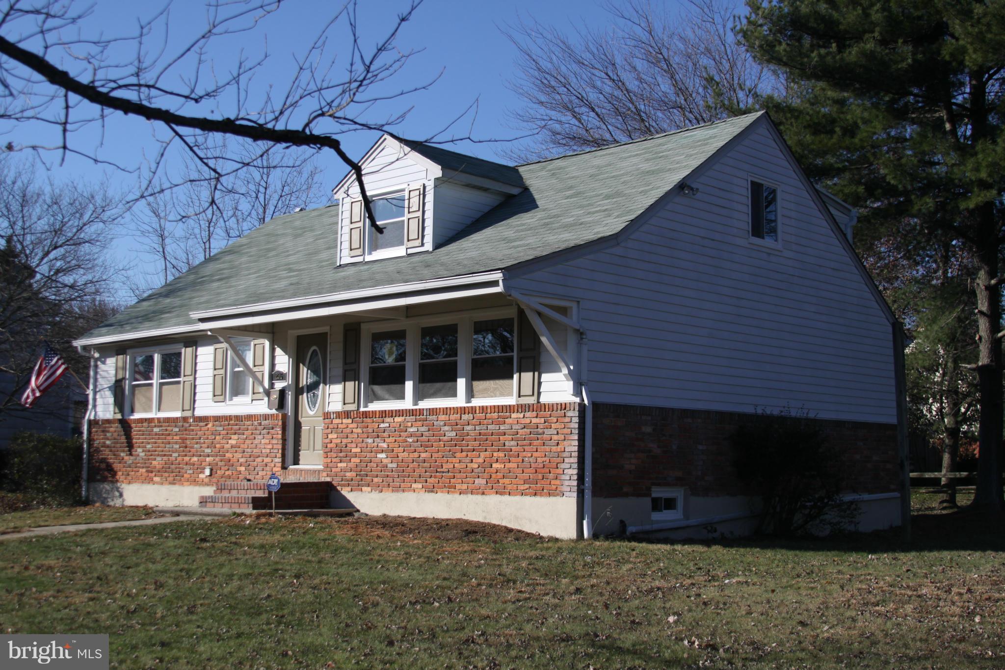 2016 Greengage Road Baltimore, MD 21244 - Photo 23 of 26 a front view of a house with a yard