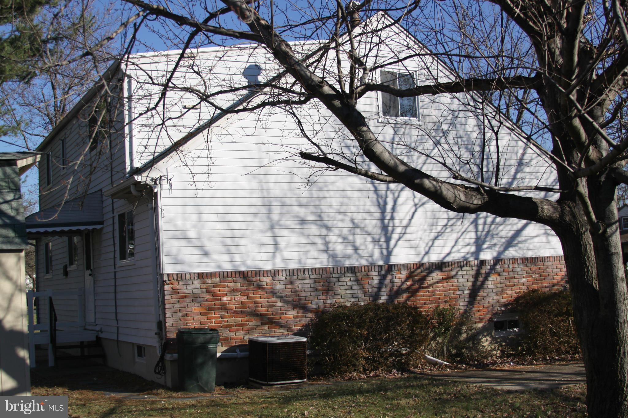 2016 Greengage Road Baltimore, MD 21244 - Photo 25 of 26 a view of a yard with large trees