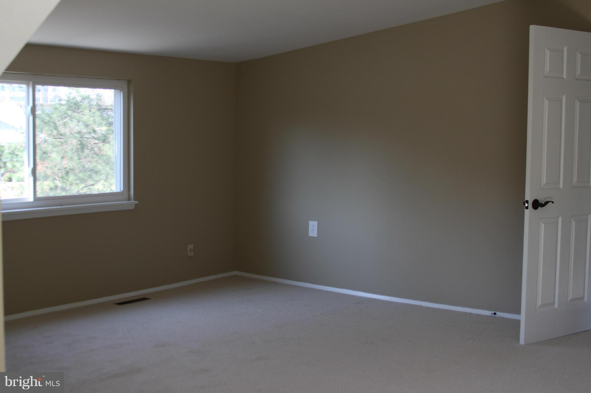 2016 Greengage Road Baltimore, MD 21244 - Photo 10 of 26 an empty room with a window
