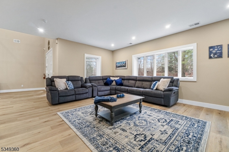 232 Kinnelon Road Kinnelon, NJ 07405 - Photo 13 of 43 a living room with furniture and a rug