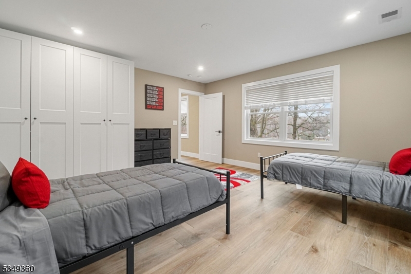 232 Kinnelon Road Kinnelon, NJ 07405 - Photo 16 of 43 a bedroom with a bed and a window