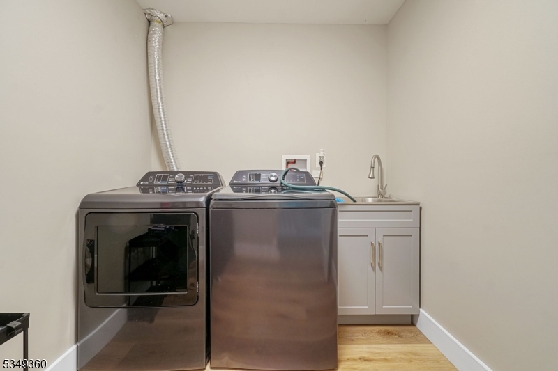 232 Kinnelon Road Kinnelon, NJ 07405 - Photo 22 of 43 a utility room with dryer and washer