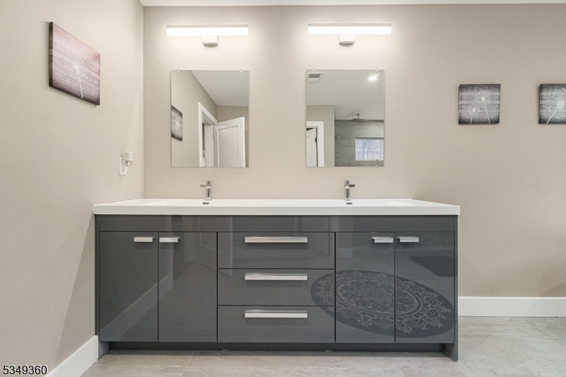 232 Kinnelon Road Kinnelon, NJ 07405 - Photo 32 of 43 a bathroom with a sink vanity and mirror
