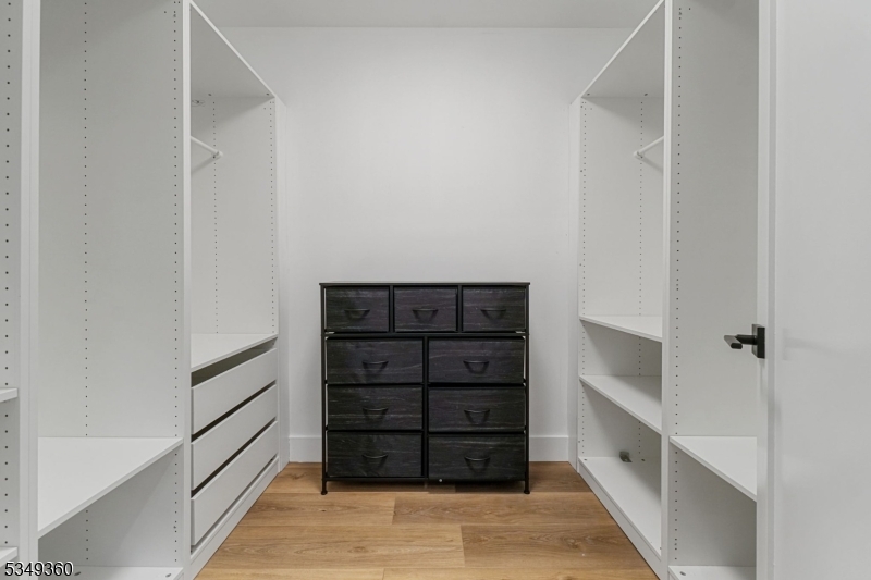 232 Kinnelon Road Kinnelon, NJ 07405 - Photo 34 of 43 a view of walk in closet with empty racks
