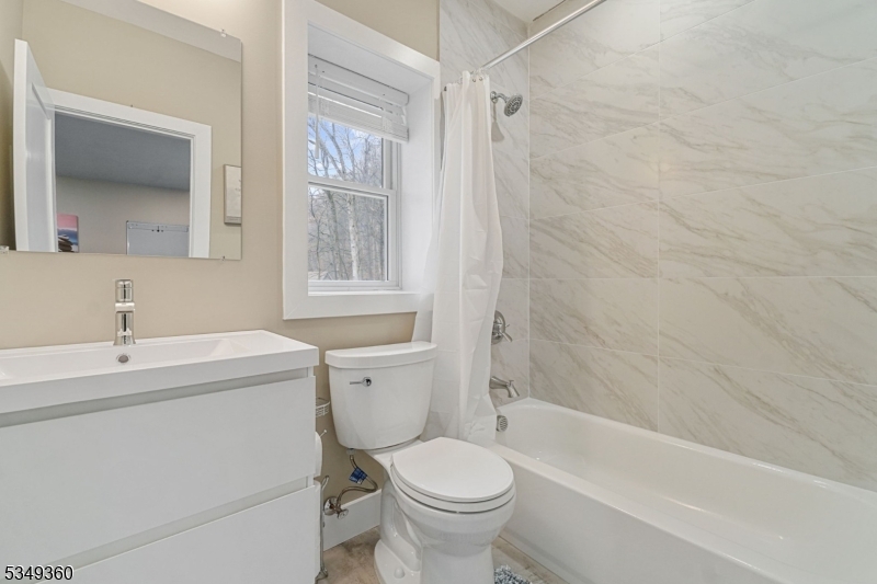 232 Kinnelon Road Kinnelon, NJ 07405 - Photo 36 of 43 a bathroom with a sink toilet and shower