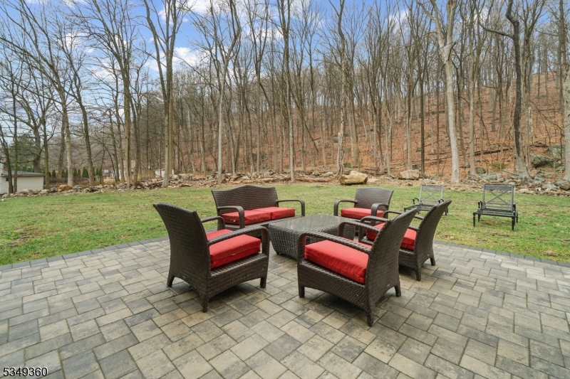 232 Kinnelon Road Kinnelon, NJ 07405 - Photo 38 of 43 a backyard of a house with outdoor seating