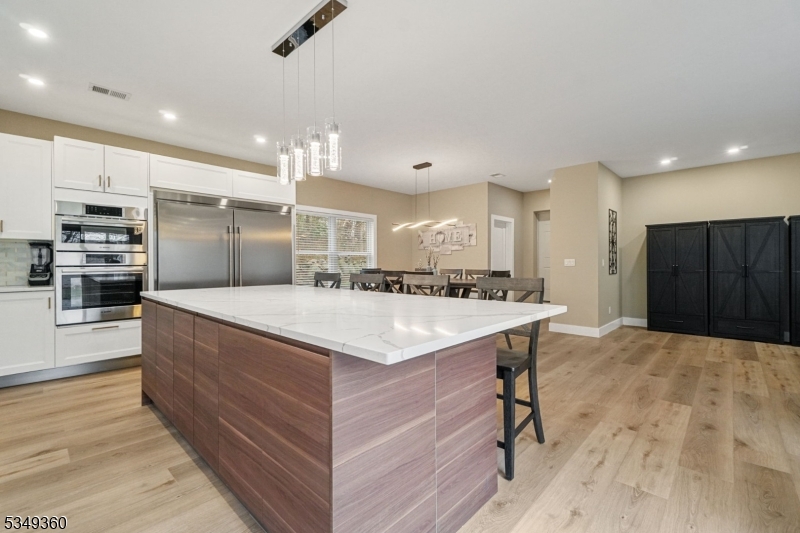 232 Kinnelon Road Kinnelon, NJ 07405 - Photo 9 of 43 a large kitchen with a stove a refrigerator and a sink