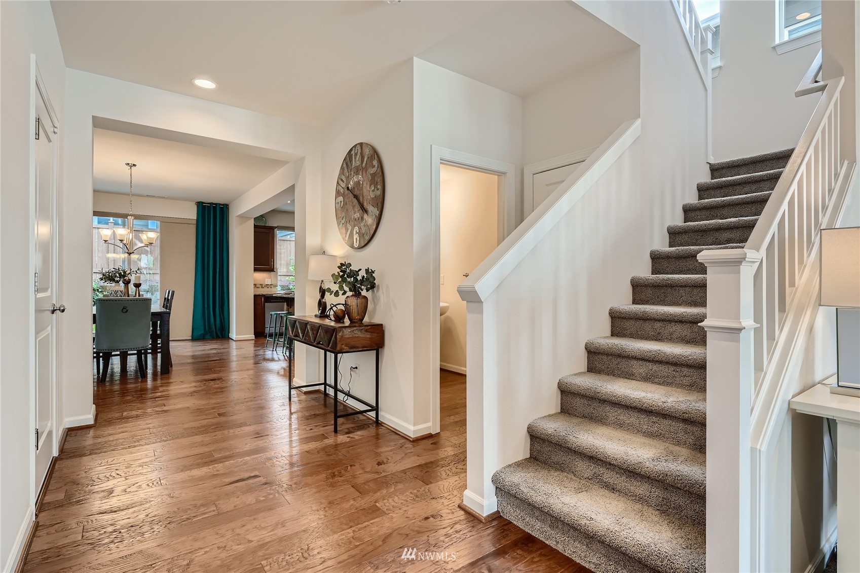 3532 198th Street Southeast Bothell, WA 98012 - Photo 21 of 39 a view of entryway and hall with wooden floor