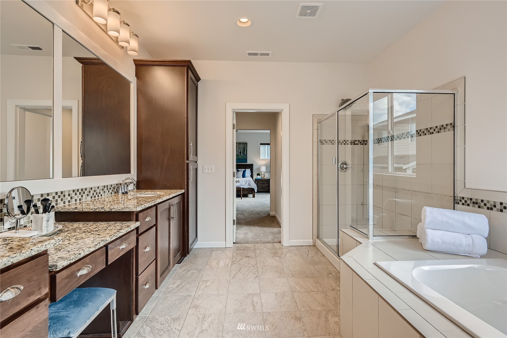 3532 198th Street Southeast Bothell, WA 98012 - Photo 24 of 39 a spacious bathroom with a granite countertop sink mirror and shower