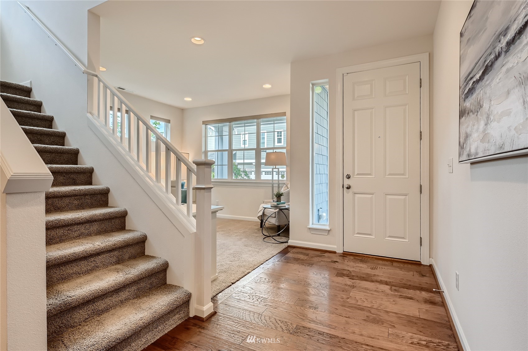 3532 198th Street Southeast Bothell, WA 98012 - Photo 4 of 39 a view of entryway and hall with wooden floor