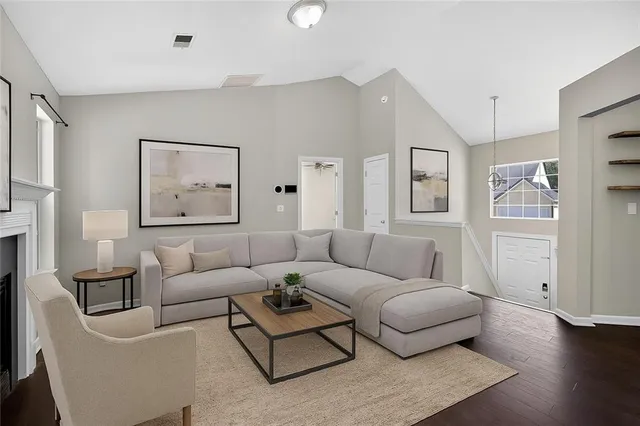 a living room with furniture and a window