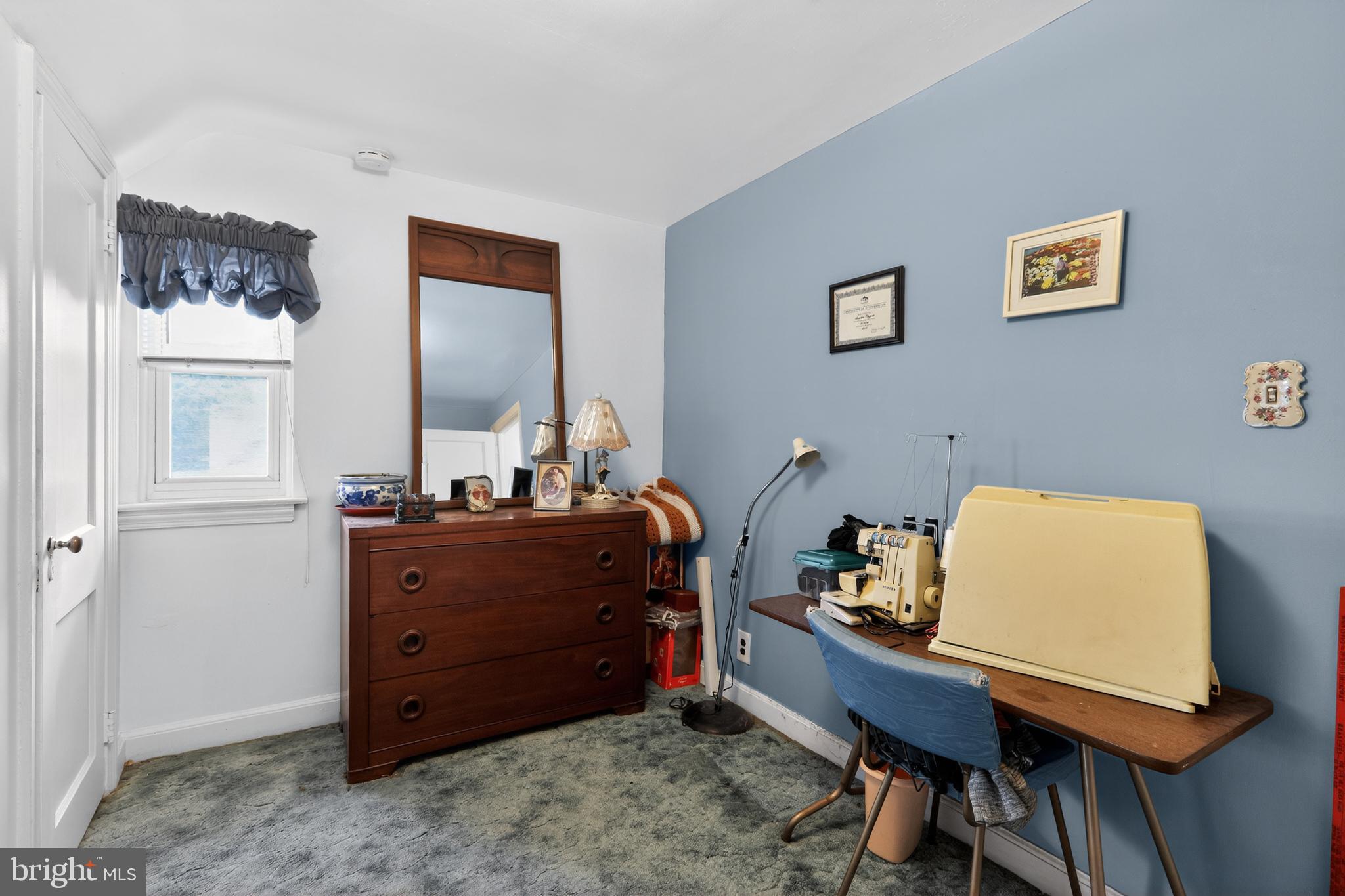 1424 Burmont Road Havertown, PA 19083 - Photo 23 of 37 a room with a table and a mirror