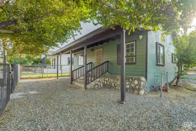 front view of a house with a street