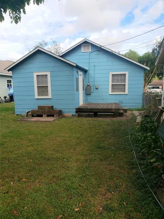 a house with garden in front of it