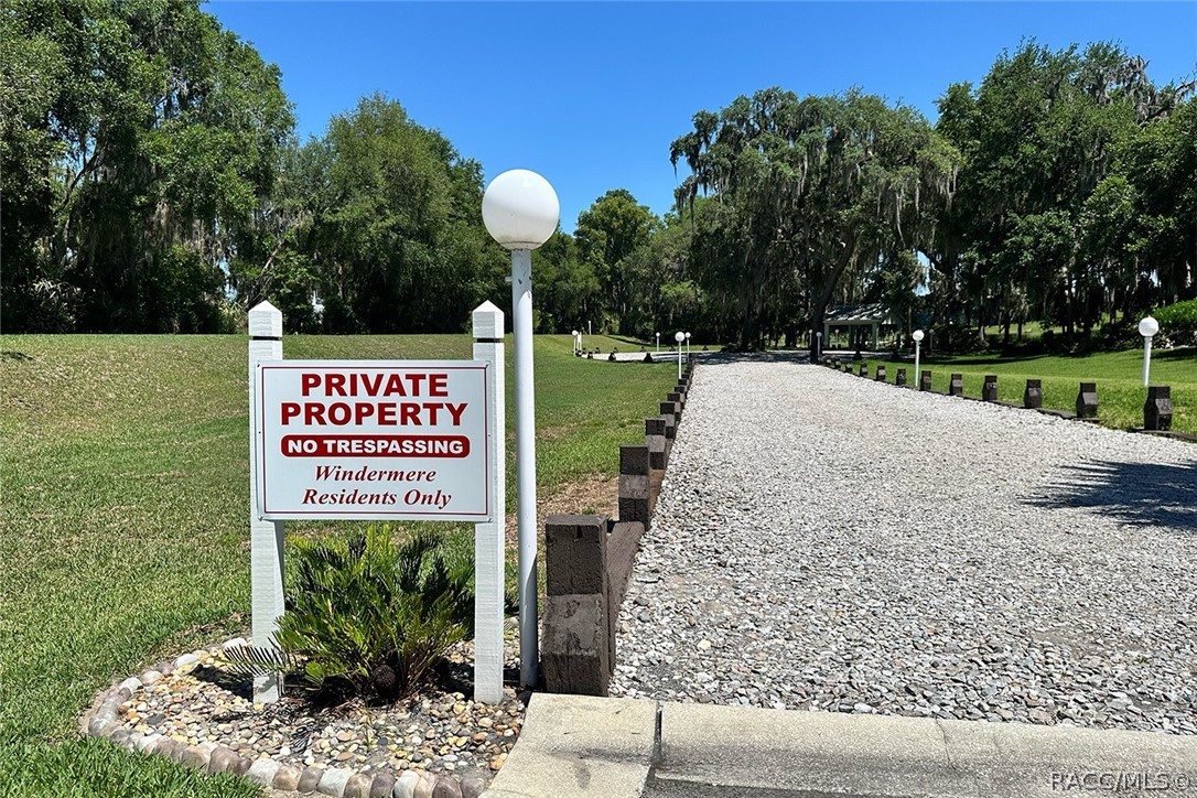 800 Balmoral Court Inverness, FL 34453 - Photo 64 of 72 a sign on the side of the building