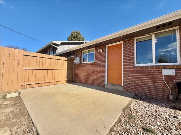 a view of a backyard of a house