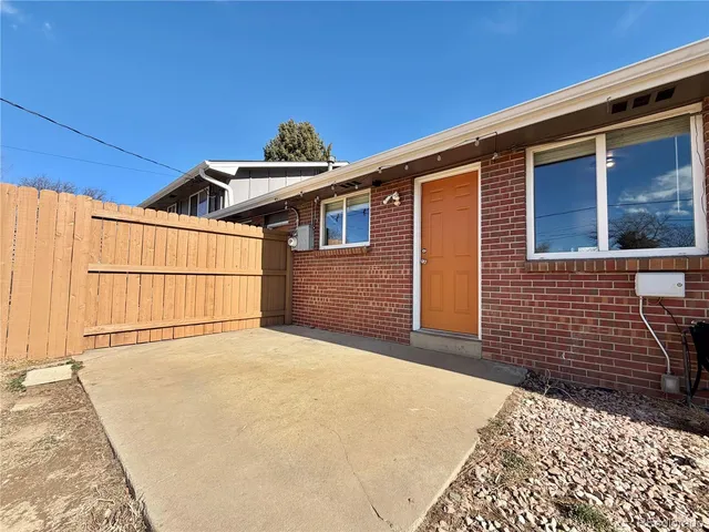 a view of a backyard of a house