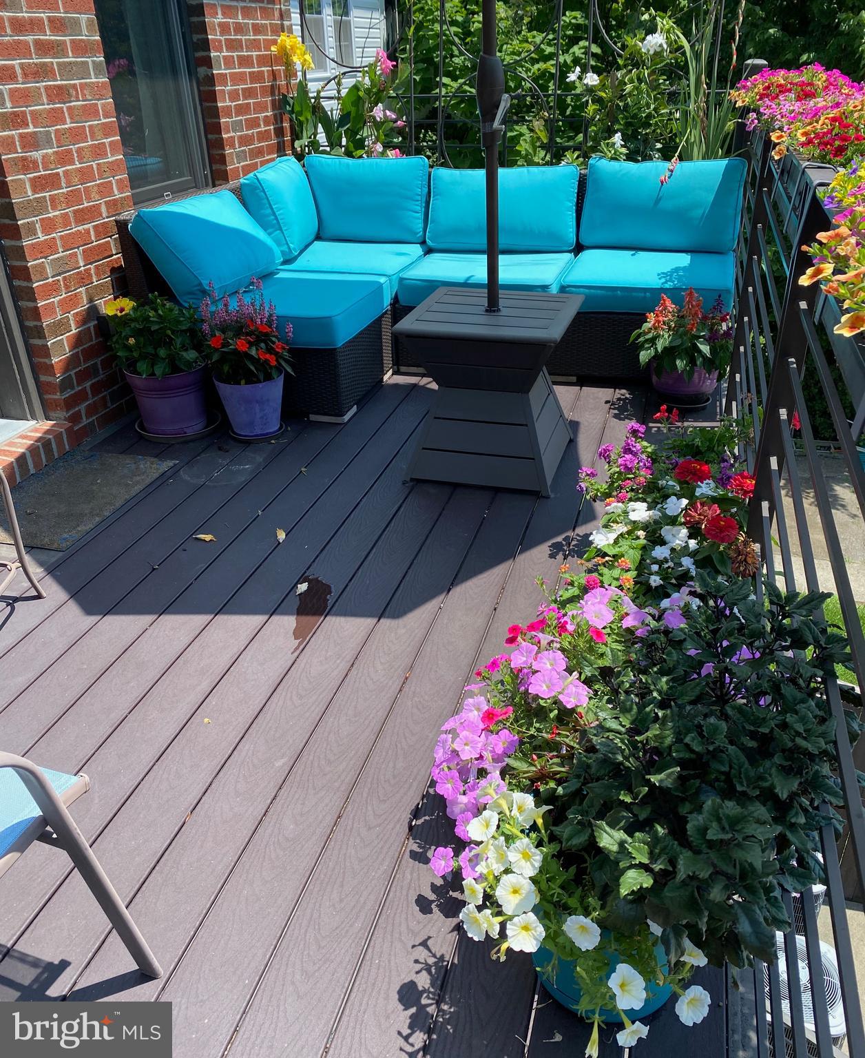 711 Jackson Street Northeast, Unit 3 Washington, DC 20017 - Photo 14 of 17 a view of a backyard with sitting area