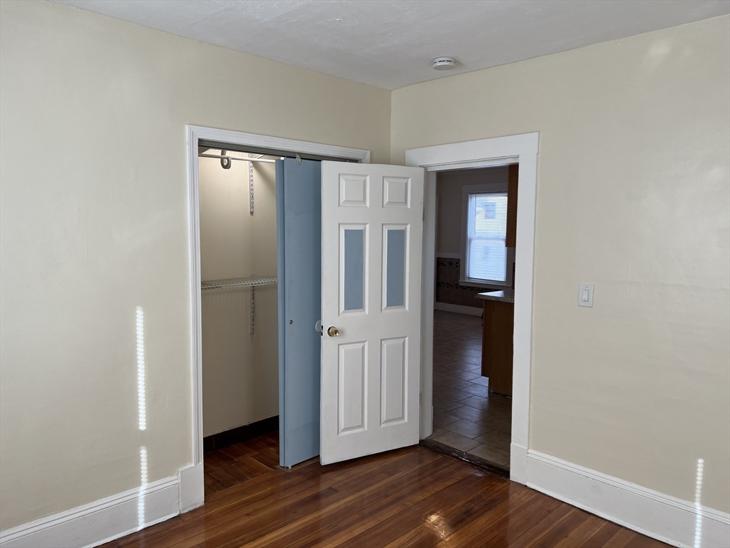 75-77 Healey Street Springfield, MA 01151 - Photo 16 of 28 a view of wooden floor in an empty room