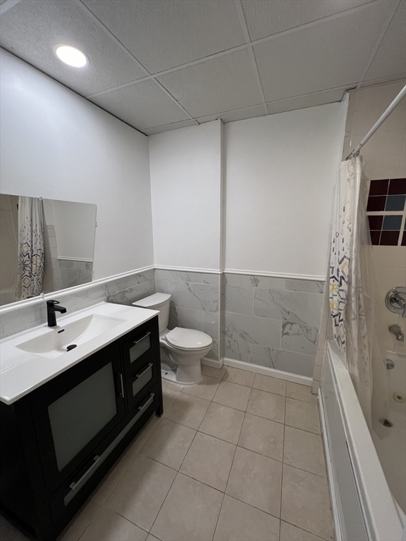 75-77 Healey Street Springfield, MA 01151 - Photo 19 of 28 a bathroom with a sink a toilet and shower