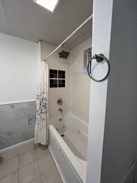75-77 Healey Street Springfield, MA 01151 - Photo 20 of 28 a bathroom with a bathtub and a shower
