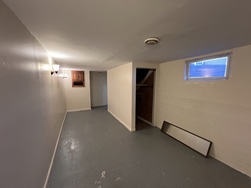 75-77 Healey Street Springfield, MA 01151 - Photo 23 of 28 a view of hallway with stairs