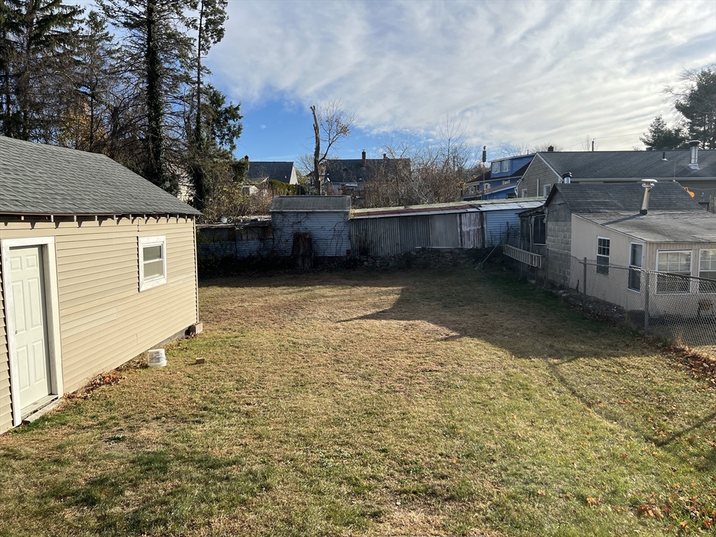 75-77 Healey Street Springfield, MA 01151 - Photo 27 of 28 a view of a terrace with wooden fence