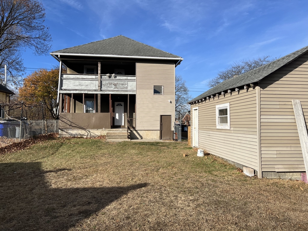 75-77 Healey Street Springfield, MA 01151 - Photo 28 of 28 a front view of a house with a yard