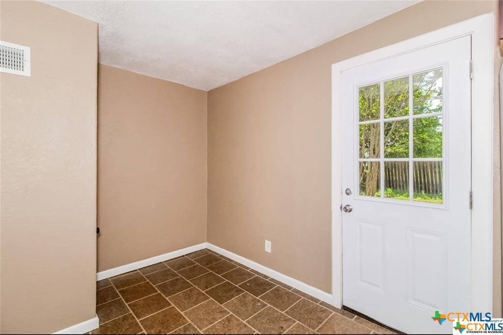 4801 Renick Ranch Road Killeen, TX 76549 - Photo 16 of 29 an empty room with windows